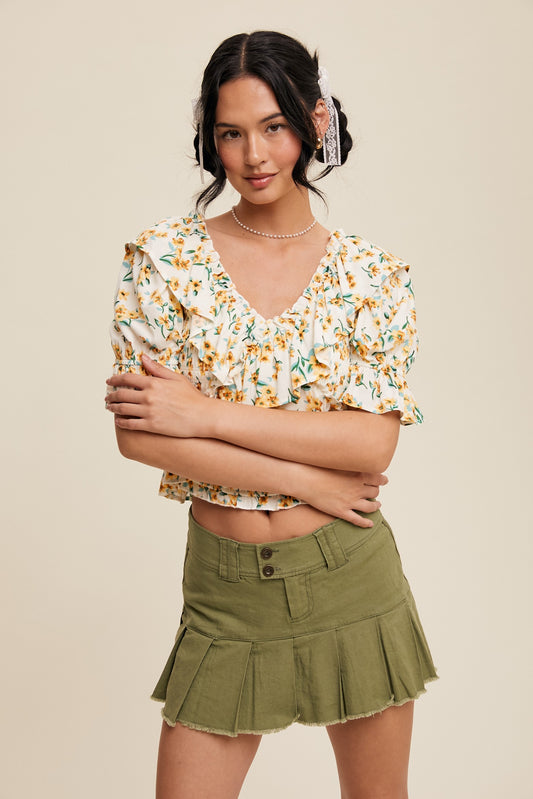 Flower Print Ruffled V-neck Blouse with lightweight fabric and elegant ruffles for a casual chic look.