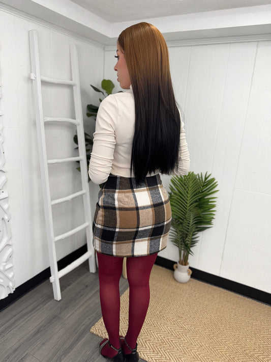 High-Waisted Plaid Skirt with a classic plaid pattern and flattering A-line silhouette for chic outfits.