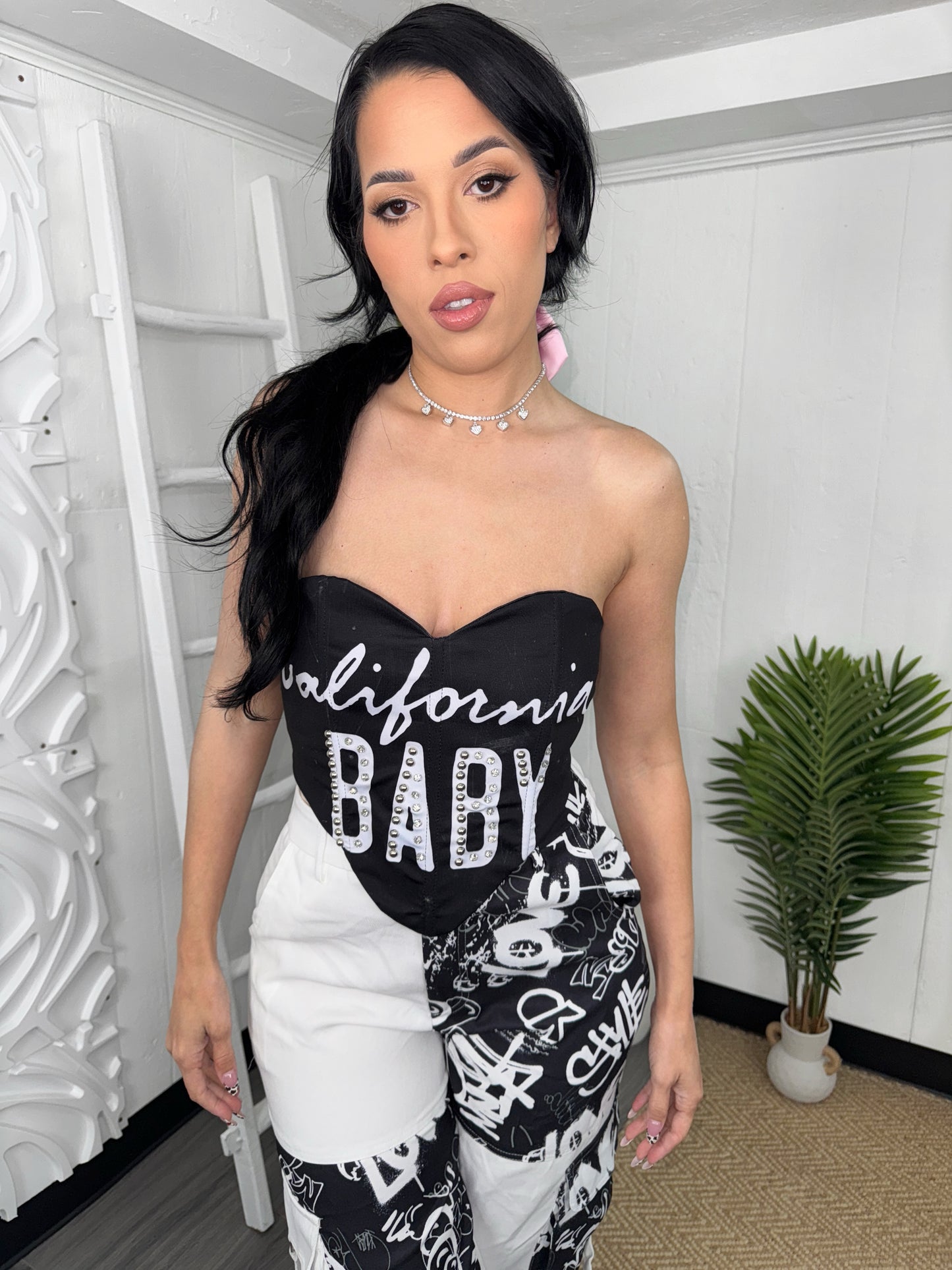 Black Baby Corset with a bold, sleek fit, perfect for edgy and chic fashion styles.