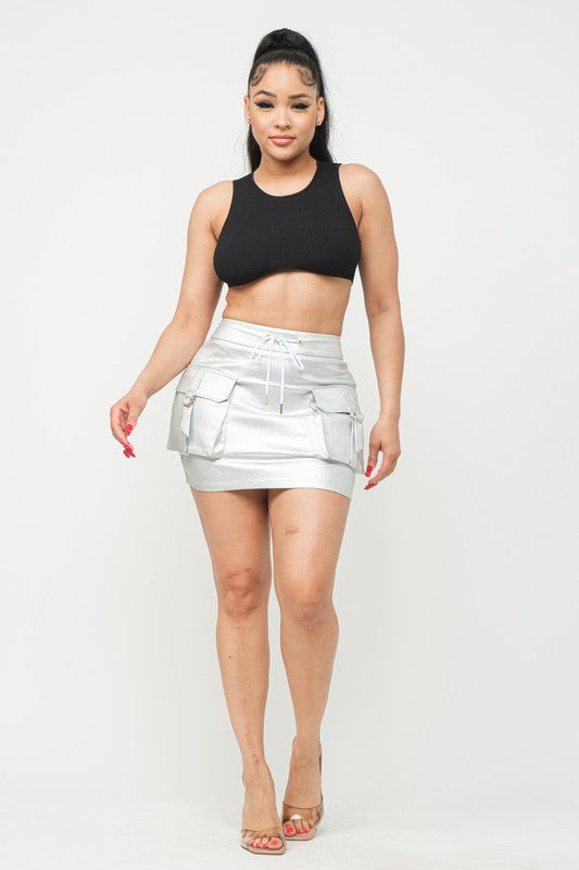 Utility Mini Skirt with cargo details, perfect for urban-chic styling.