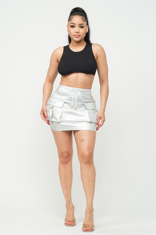 Utility Mini Skirt with cargo details, perfect for urban-chic styling.