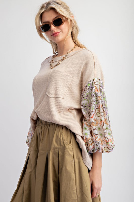 Print Novelty Rib Knit Top with short sleeves and stretchy ribbed fabric for a trendy, casual look.