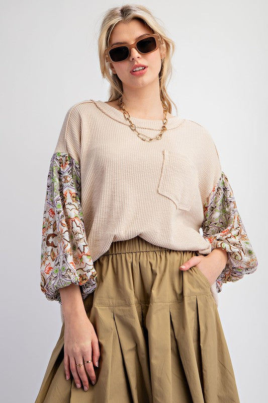 Print Novelty Rib Knit Top with short sleeves and stretchy ribbed fabric for a trendy, casual look.