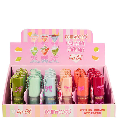 KEVIN AND COCO HAVE SOME COCKTAILS LIP OIL