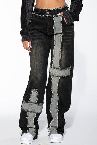 Black Frayed Jeans with a washed finish and distressed hem.